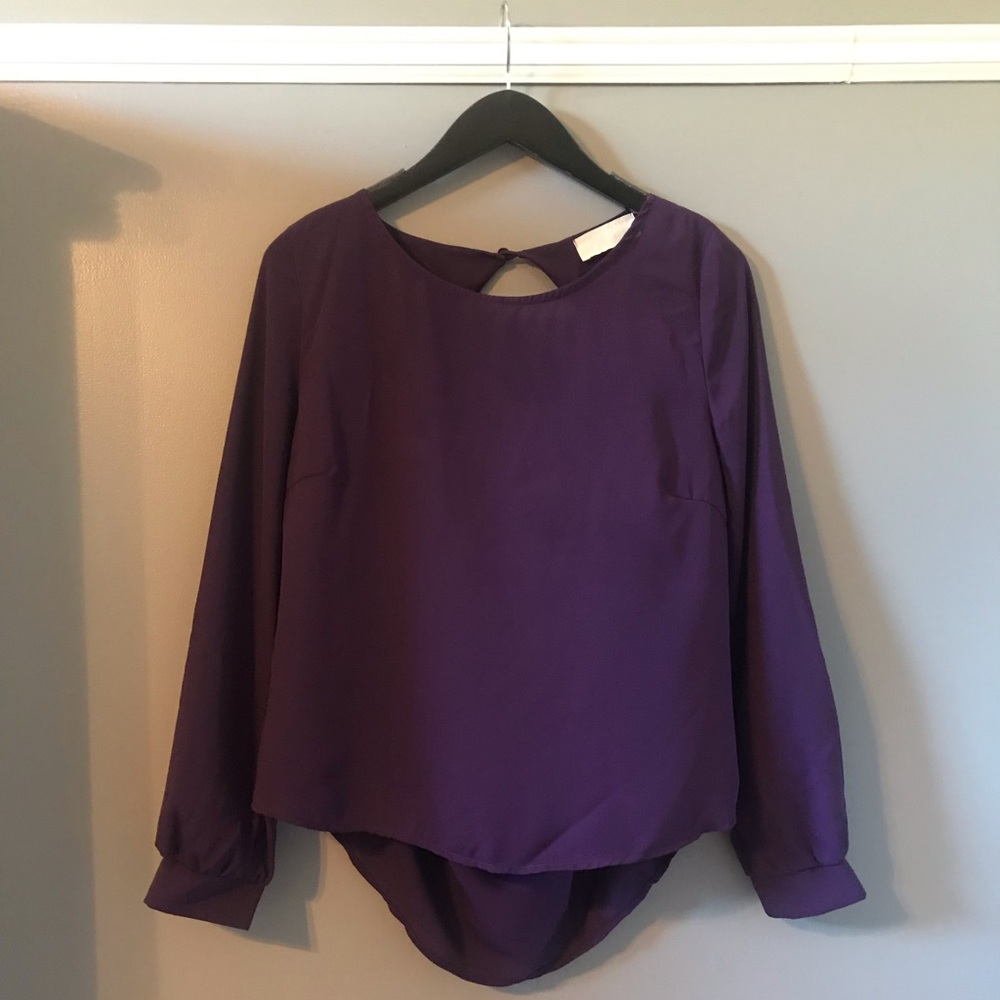 Dark purple blouse with open back